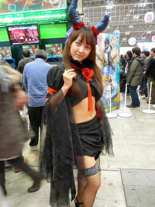 Illustration for article titled 2009's Cosplaying Arcade Game Booth Companions